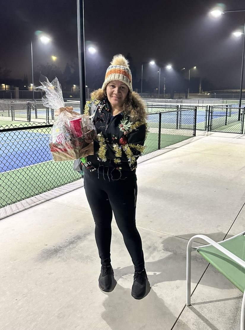 Sue, Gold medalist for Ugliest Sweater Winners